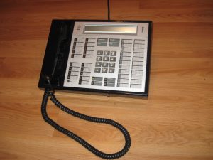 An image of an AT&T 7407 digital office telephone