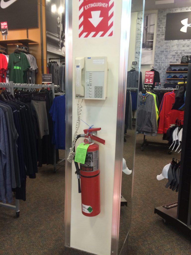 a picture of a ROLM telephone on a post at a local Bob's Stores in Nashua, New Hampshire