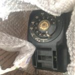 a picture of a Stromberg Carlson 500 telephone being unpacked